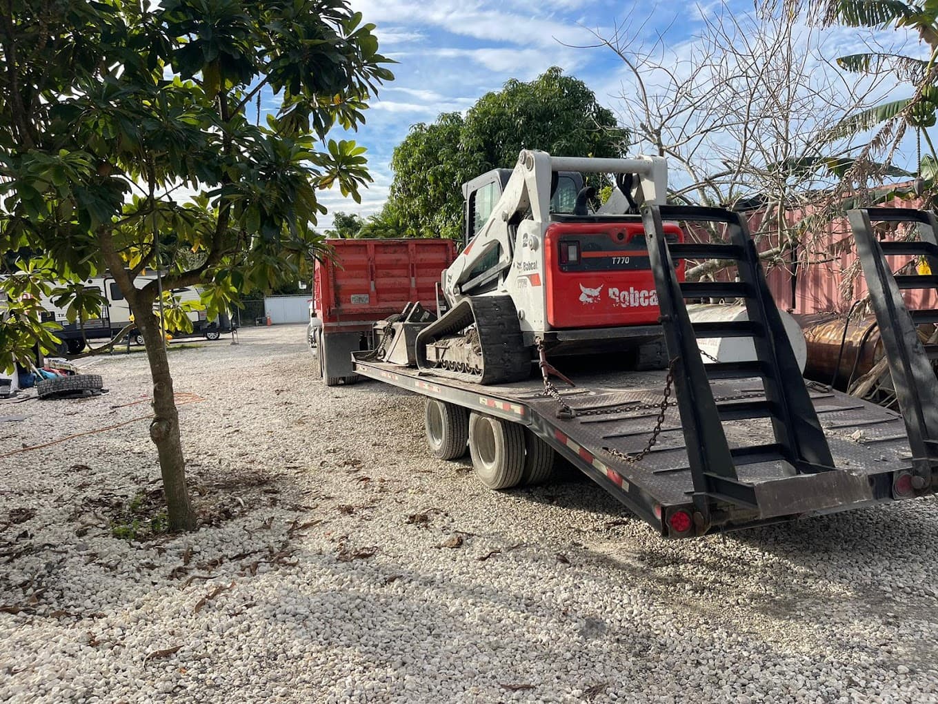 Yoel Bobcat Service crew and equipment